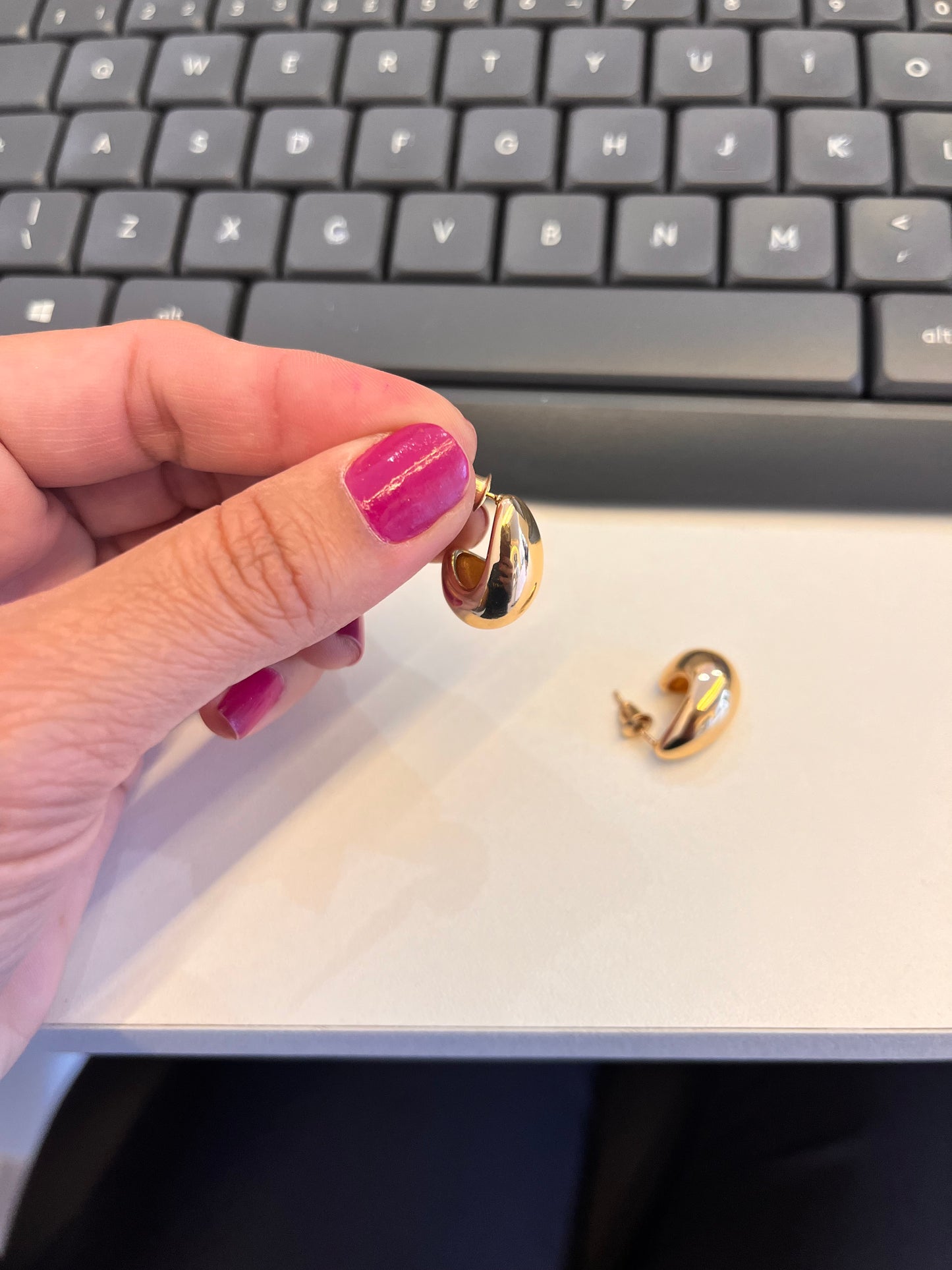 BRINCO GOTA DOURADO