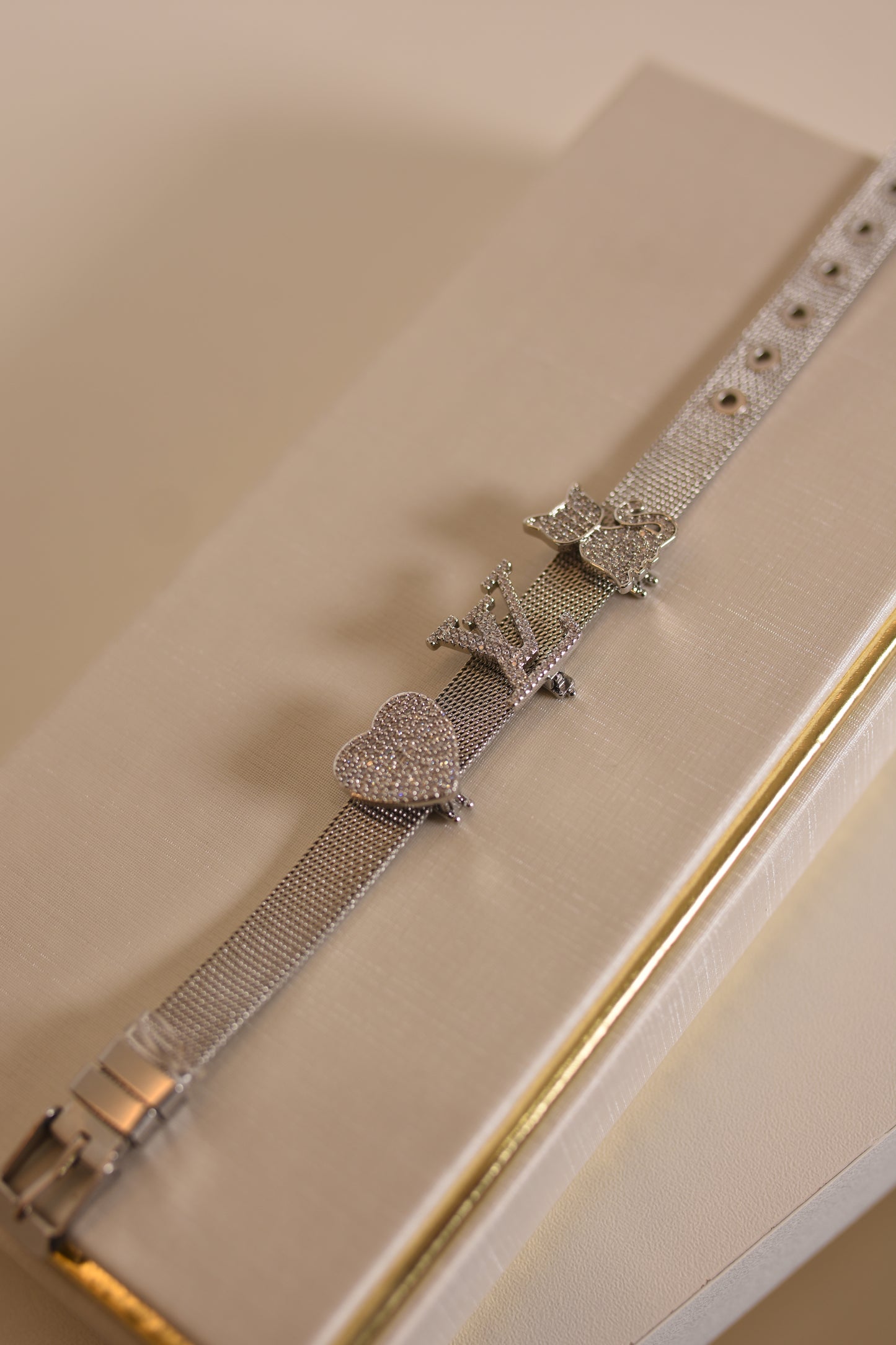 PULSEIRA COM BERLOQUES PRATA